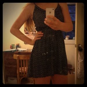 A dark blue polka-dotted dress
