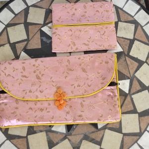 - big pink Chinese wallet.    Small coin wallet
