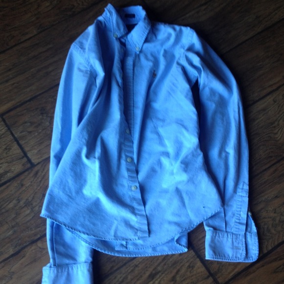 Women's slim fit blue polo.