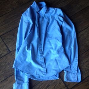 Women's slim fit blue polo.