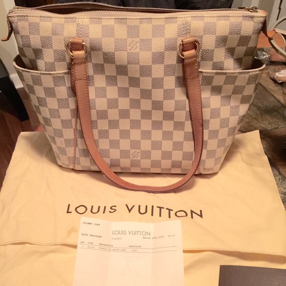 Sold on eBay.  Louis Vuitton totally pm azur