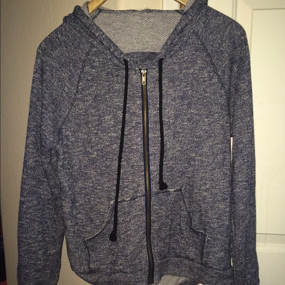 dark colored jacket with cut back
