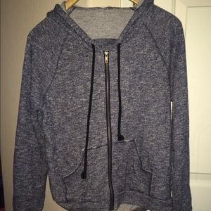 dark colored jacket with cut back