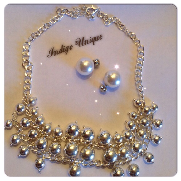 Pearl earrings and silver bead necklace