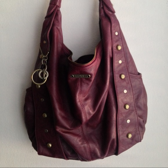 Burgundy Roxy purse with gold metal detail