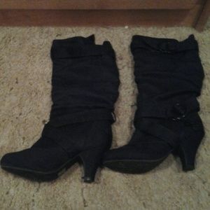 Black heel boots.