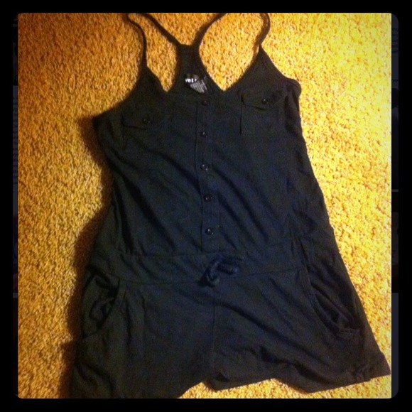 A black tank connect to shorts .