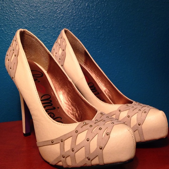 Off white, studded heels.