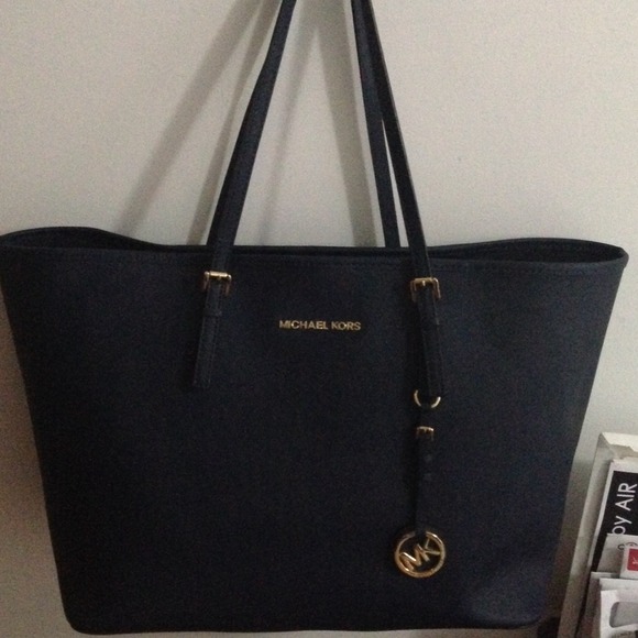 Authentic MK medium tote in navy blue