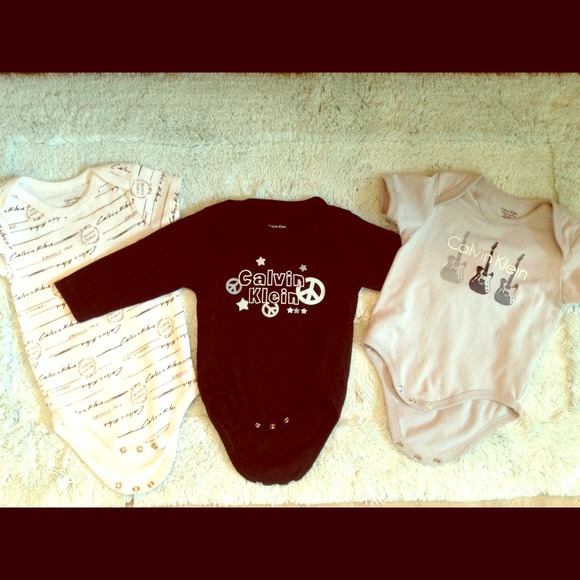 Calvin Klein baby onesies