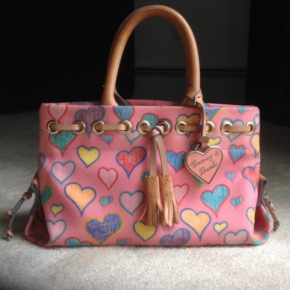 Dooney and Bourke tiny tassel leather in raspberry