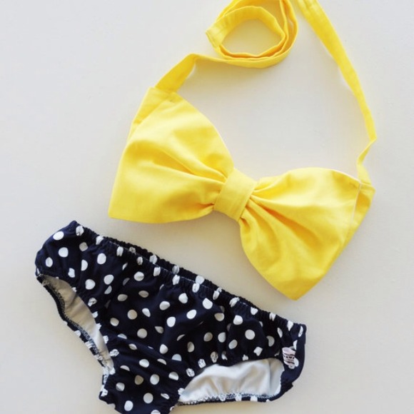 Yellow bow bikini top w/ polka Dot bottoms.