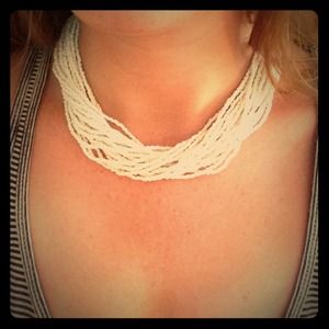 Multi strand white beaded necklace