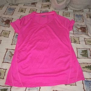 pink qwick dry performance shirt. never been worn