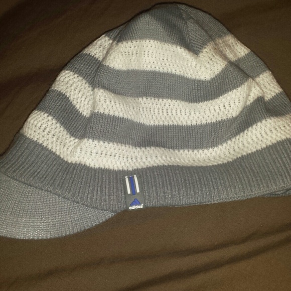 White and grey striped Adidas hat