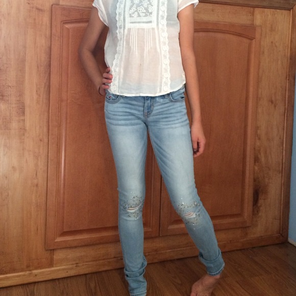 Hollister light wash jeans. Gems at knees