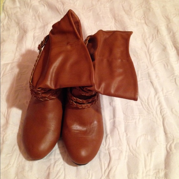 Tan pair of braided booties.