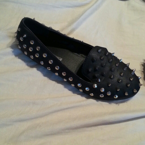 Foreign Exchange Black Flats