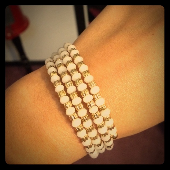 Gold and white gem bracelet.