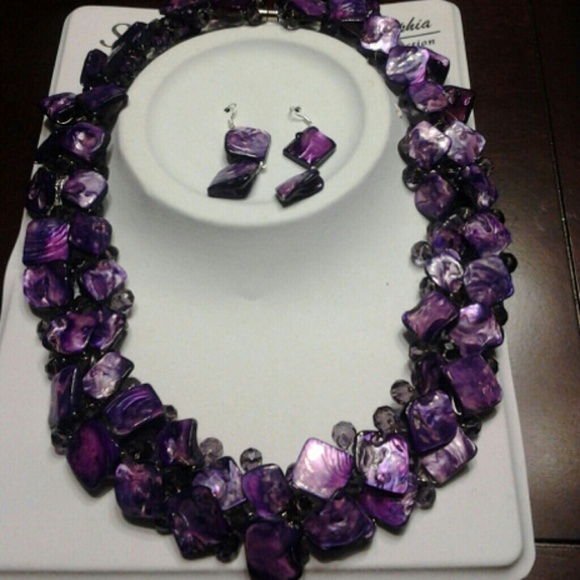 Purple coral  three piece  with magnetic clasps.