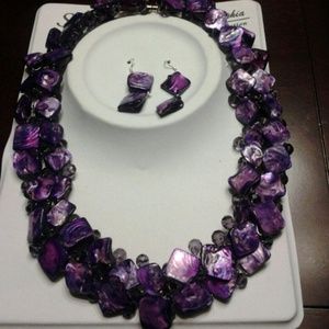 Purple coral  three piece  with magnetic clasps.