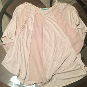 Dolman bat wing cream top