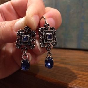 2 pair of silver and blue earrings