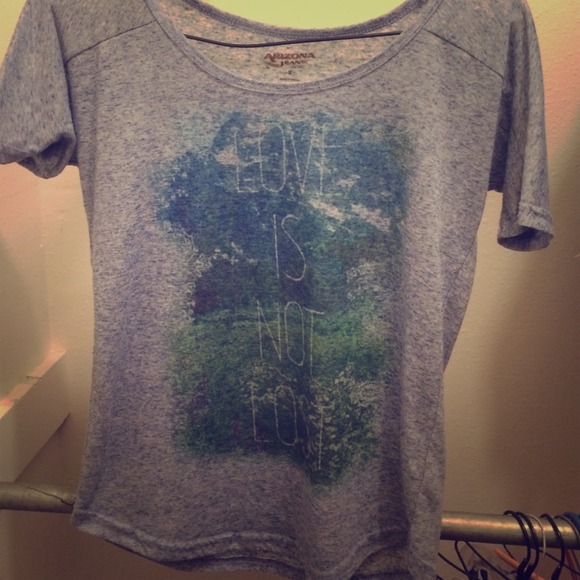 Small top. Says "Love Is Not Lost."