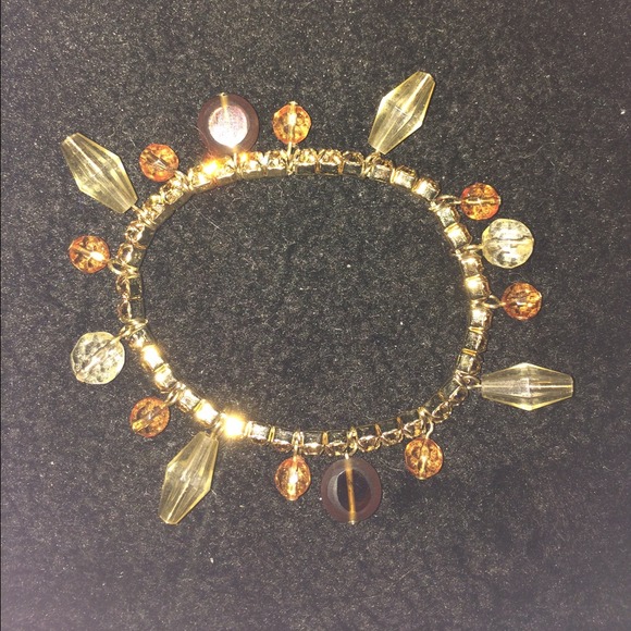Beautiful bracelet with gold and brown beads - Picture 2 of 3