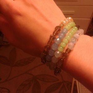 4 glossy colored bracelets