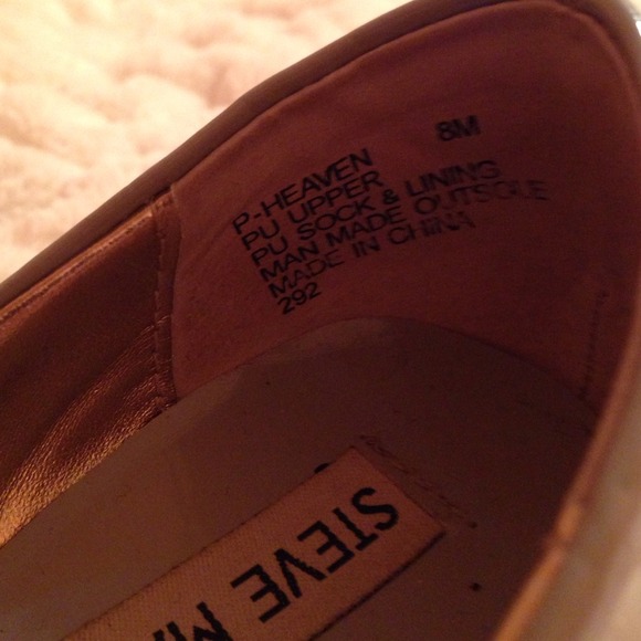 Light grey Steve Madden flats.