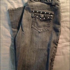 Gray skinny jeans with studs
