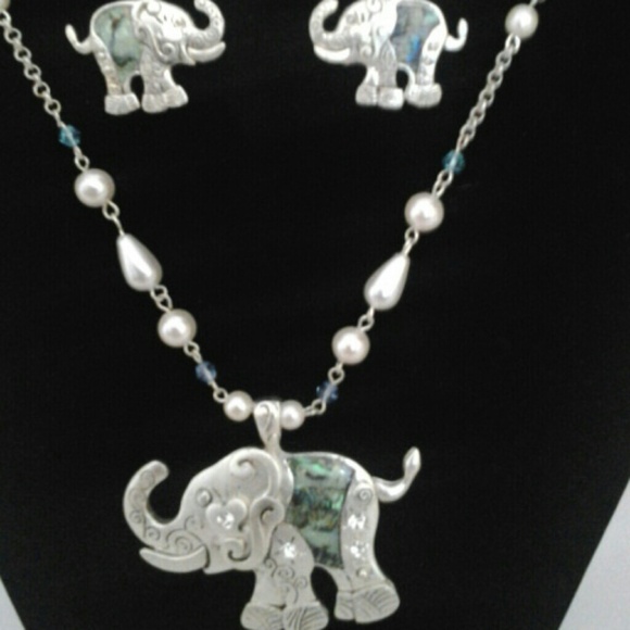 Abalone elephant with pearl chain set.