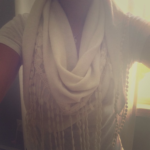 Ivory scarf with details. From  New York boutique.