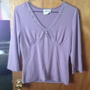 Purple stretchy top with sequins size Lg