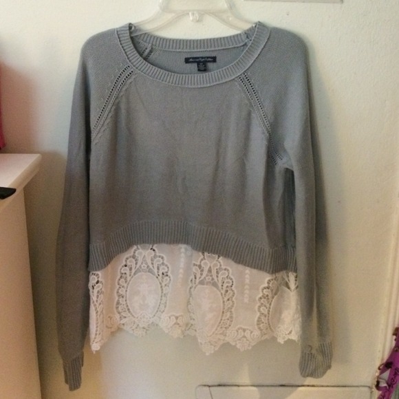 Gray sweater with lace underlay