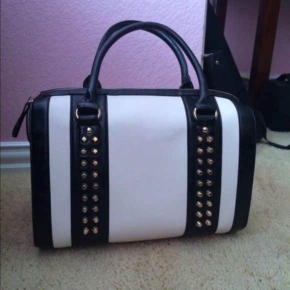Studded black and white bag