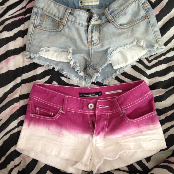 2 pairs of super cute distressed jean shorts.
