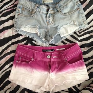 2 pairs of super cute distressed jean shorts.