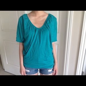 Turquoise top with crochet back detailing