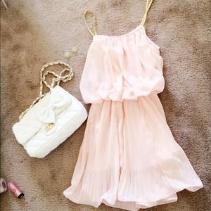 Pink Dress With Ruffle Bottom and Gold Strap