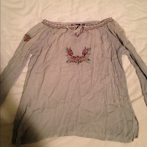A barely worn sunahara long sleeve blueish top
