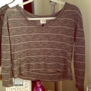 Long sleeve dark green and beige striped shirt.