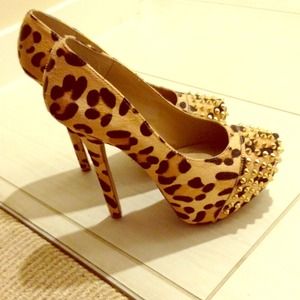 Steve Madden leopard print with gold spike heels