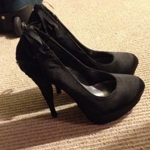 Black heels with gorgeous detail on back