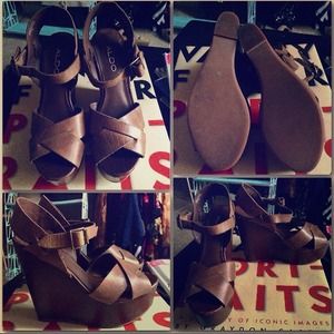 Aldo's brown leather wedges