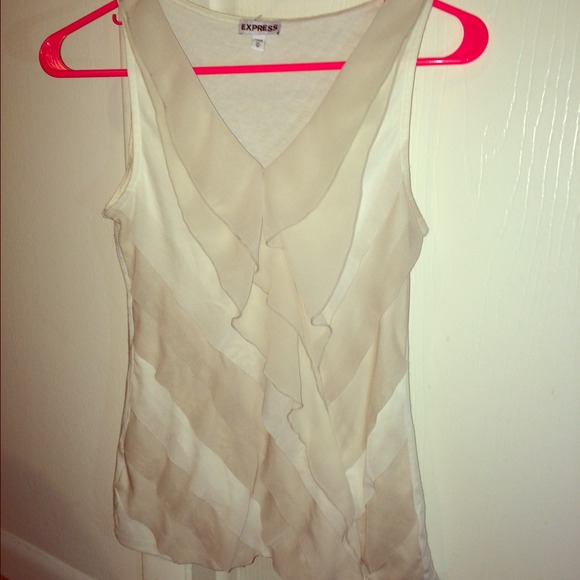 I am selling a white and beige express tank top!