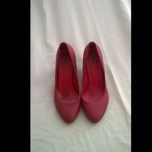 Red heel pumps