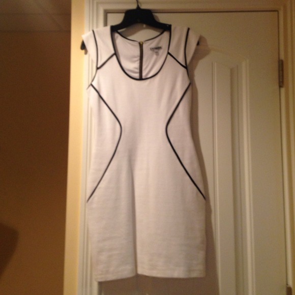 Express dress size 4.  White with black piping.
