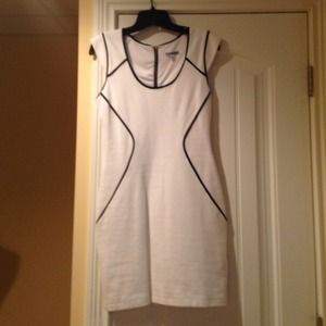 Express dress size 4.  White with black piping.